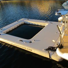 an inflatable boat floating on the water