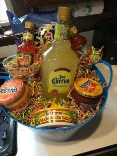 an assortment of condiments in a blue bowl