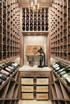 a wine cellar with lots of bottles in it