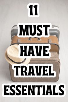 the words 11 must have travel essentials written over an image of two suitcases