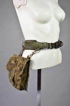 Post Apocalyptic Belt Bag - Tactical Hip Sachet - Handmade Belt Pouch - Distressed - Utility Hip Bag - LARP Accessory - Postapoc Equipment Belt with hip sachet. Made of strong military materials, it will be perfect for everyday use, festivals and survival trips. in a handy bag you can hide the most important things, the strap is also equipped with additional D-rings to which you can attach other equipment. SIZE: For perfectly fitted belt bags, please provide us with your measurements: C - hip circumference Please Note: The product seen on the pictures is a representative of the style. Individual bags may look slightly different than the presented prototype. If you are interested in a custom order, or want us to modify the design for you - contact us. More clothes: https://www.etsy.com/shop Fantasy Bag Belt, Distressed Clothing Post Apocalyptic, Post Apocalyptic Backpack, Dystopian Accessories, Apocalypse Accessories, Apocalypse Bag, Post Apocalyptic Outfit Women, Apocalypse Aesthetic Clothes, Post Apocalyptic Accessories