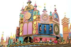 an elaborately decorated building on top of a hill