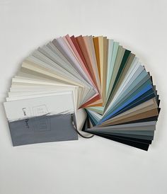 an assortment of color swatches on a white surface