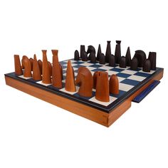 a wooden chess set with black and white pieces