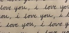 a handwritten note with the words i love you written in cursive writing