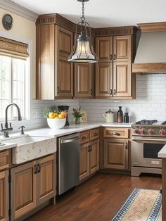 a kitchen with wooden cabinets and stainless steel appliances, including a dishwasher in the center