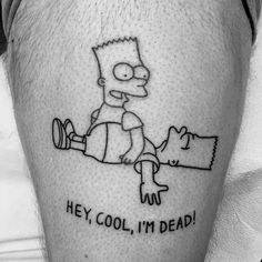 a man with a tattoo on his leg that says hey cool, i'm dead