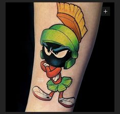 an image of a cartoon character tattoo on the left arm and leg, which has been drawn