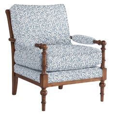 a blue and white patterned chair with wooden legs on an isolated white background for use in furniture design