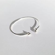 Duo Double Knot Adjustable Bangle Bracelet Minimalist Sterling Silver Bracelet With Sliding Knot, Adjustable Bracelet With A Modern Twist, Adjustable Sterling Silver Timeless Bangle, Sterling Silver Bangle Bracelet, Adjustable Minimalist Bangle Bracelet, Adjustable Modern Twist Bangle, Knot Bangle, Silver Bangle Bracelet, Silver Bangle Bracelets