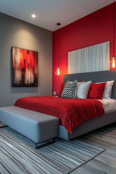 a red and gray bedroom with a large bed