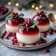 three desserts on a plate with pomegranate