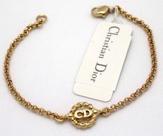 Christian Dior Symbol Bracelet Goldplated Chain With CD Etsy Dior Bracelet, Jewelry Showcase, Dior Jewelry, Jewelry Show, Plain Black, Bracelet Gold, Chain Link Bracelet, Fashion Bracelets