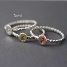 Initial Ring, Bead Ring, Sterling Silver, Personalized, Midi Ring, Brass, Copper, Custom Ring, Mothers Ring, Letter Ring, Bridesmaid Ring Featuring a NEW bead initial ring to love! You will receive 1 gorgeous initial ring with the custom initial of your choice ... sweetheart initials, kids initials...its up to you. You get to choose the disk metal color and the option of having the initial on the disk antiqued or without antiquing too. The disk without antiquing has more of a subtle look compare Silver Beaded Rings For Anniversary, Silver Beaded Rings For Gift, Anniversary Beaded Round Ring, Bridesmaid Ring, Jewellery Maker, Mothers Ring, Bridesmaid Rings, Petite Ring, Letter Ring