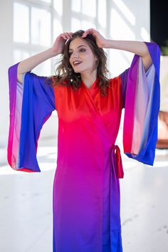 "Satin kimono dress with color transitions in purple and red Light and airy \"Wings\" sewn into the sleeves, which complement the airy image of the dress ➤ Features > dress length: 58,5 inches / 148cm cm ➤ Sizing My Size Guide in FAQ section below will help you define the perfect size match. The item can also be made according to your measurements - just message them to me. ➤ Delivery Your item is made-to-order and will be ready within 2-7 days. Average delivery times: > North America: up Vibrant Spring Dress With Kimono Sleeves, Red Long Sleeve Robe For Summer, Long Red Summer Robe, Red Long Sleeve Summer Robe, Red Dress With Kimono Sleeves For Party, Red Summer Robe For Vacation, Red Summer Vacation Robe, Red Summer Robe With Kimono Sleeves, Red Robe With Kimono Sleeves For Summer