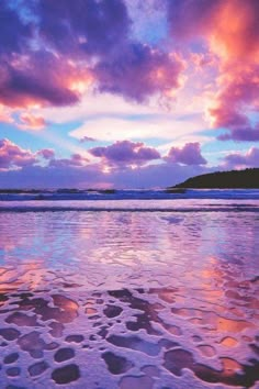 an instagram page with the sky and clouds reflected in water at sunset or dawn