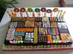 a cake decorated with lots of candy and candies