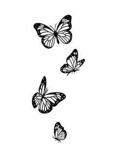 three butterflies flying in the air with black and white ink on it's wings