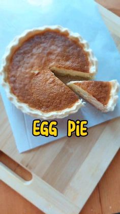 an egg pie sitting on top of a cutting board