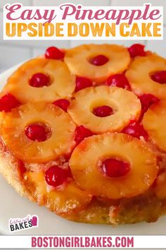 A pineapple upside-down cake featuring maraschino cherries and a brown sugar pineapple topping sits elegantly on a white cake stand. Nearby, a bowl of cherries graces the light-colored table, where a lacy edge plate is partially visible. Classic Easter Desserts, Pineapple Upside Cake, Caramelized Pineapple, Maraschino Cherries, Cake Platter, Pineapple Upside, Pineapple Upside Down Cake, Pineapple Upside Down, Pineapple Cake