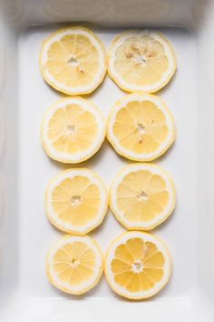 lemon slices arranged in a square white dish