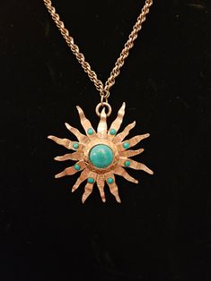 Vintage Labre silver/faux turquoise starburst medallion necklace.  Made in the 60s or 70s.  Excellent condition.  Approx 2.5 inches in diameter. No refund disclaimer Our store sells pre-owned and vintage items that may be 20 years old or older and may not be in perfect condition. Prices are determined by age, condition, and rarity. Descriptions and photos are provided for each item, with detailed information and pictures from multiple angles. Videos may also be available for most items. We aim t 70s Accessories Necklaces, 70s Necklace, Starburst Necklace, Medallion Necklace, The 60s, Rarity, Turquoise Jewelry, 20 Years, Necklace Etsy