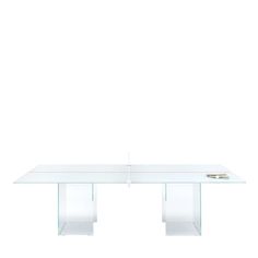 a glass table with two legs and a pen on the top, in front of a white background