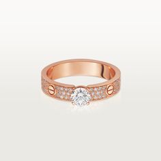 Cartier - LOVE Solitaire - Ring Woman Pink gold/Diamond - LOVE solitaire, 18K rose gold (750/1000), set with a brilliant-cut diamond available from 0.30 to 0.34 carat and paved with brilliant-cut diamonds. Please note that the carat weight, number of stones and product dimensions will vary based on the size of the creation you order. For detailed information please contact us. Cartier Love Ring Diamond, Rings Cartier, Cartier Wedding Rings, Diamond Ring Cuts, Cartier Love Ring, Cartier Love, Cartier Ring, Love Ring, Gold Platinum