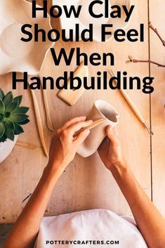 a person holding a cup with the words, how clay should feel when handbuilding