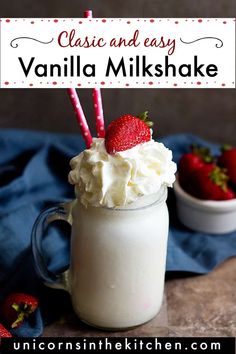 the best ever vanilla milkshake recipe in a mason jar with strawberries on top