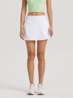 Why We Love It: Experience the perfect blend of style and functionality with the Bella A-line Tennis Skirt. This versatile piece is designed to elevate your performance on the court while keeping you looking chic. Fit and Features: A-line silhouette for a flattering and feminine fit. Built-in shorts provide comfort and coverage. High-waist design for added support and a sleek look. Lightweight and breathable fabric ensures maximum comfort during intense matches. Moisture-wicking technology keeps Lavender Mist, Freedom Of Movement, Tennis Skirt, Sleek Look, Keep Your Cool, The Court, White Skirts, Love It, Moisture Wicking