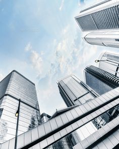 looking up at skyscrapers in the city - stock photo - images