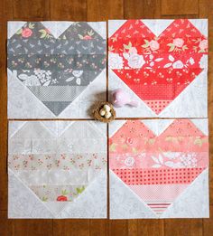 four heart shaped quilts laid out on top of each other