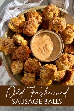 A serving dish filled with Old Fashioned Sausage Balls and a ramekin of Cajun Dipping Sauce Cajun Sausage Balls, Sausage Ball Dip, Sausage Balls Dipping Sauce, Southern Sausage Balls, Sausage Ball Dipping Sauce, Sauce For Sausage Balls, Dipping Sauce For Sausage Balls, Dipping Sauce For Sausage