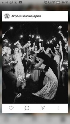 a group of people holding sparklers in their hands and posing for a photo on instagram