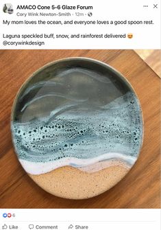 a bowl that is sitting on top of a wooden table next to a tweet