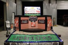 the truck is decorated with banners and other sports related items on it's flatbed