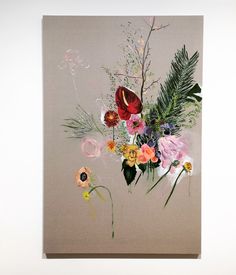 a painting with flowers and leaves on it