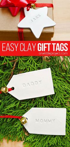 two tags with the words easy clay gift tags on them, tied to a christmas tree