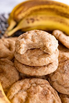 some cookies and bananas are stacked on top of each other