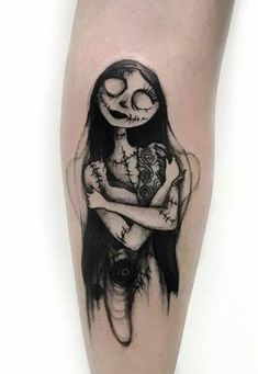 a woman with long hair and a skull on her arm is shown in black ink