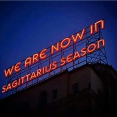 we are now in sagitaruus season neon sign lit up at night time