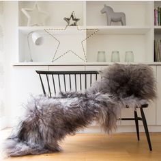 a chair that has some fur on it