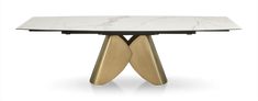 a white marble table with gold legs and an oval shaped wooden dining room table top