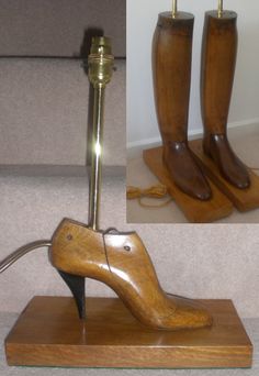 a pair of wooden shoes sitting on top of a wooden platform next to a lamp