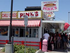 people are lined up outside the pink's diner