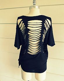 a mannequin wearing a black shirt with skeleton cutouts on it's back