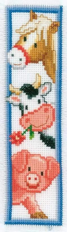 a cross stitch pattern with three pigs on it