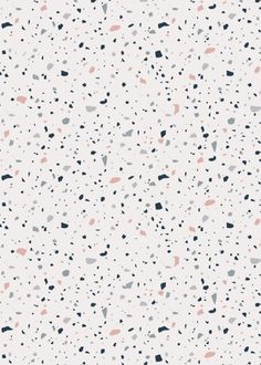 a white and black speckled wallpaper with small dots on the bottom half of it