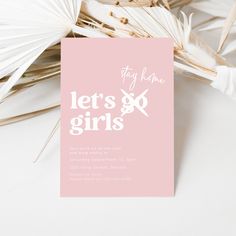 a pink card with the words let's go girls written in white on it